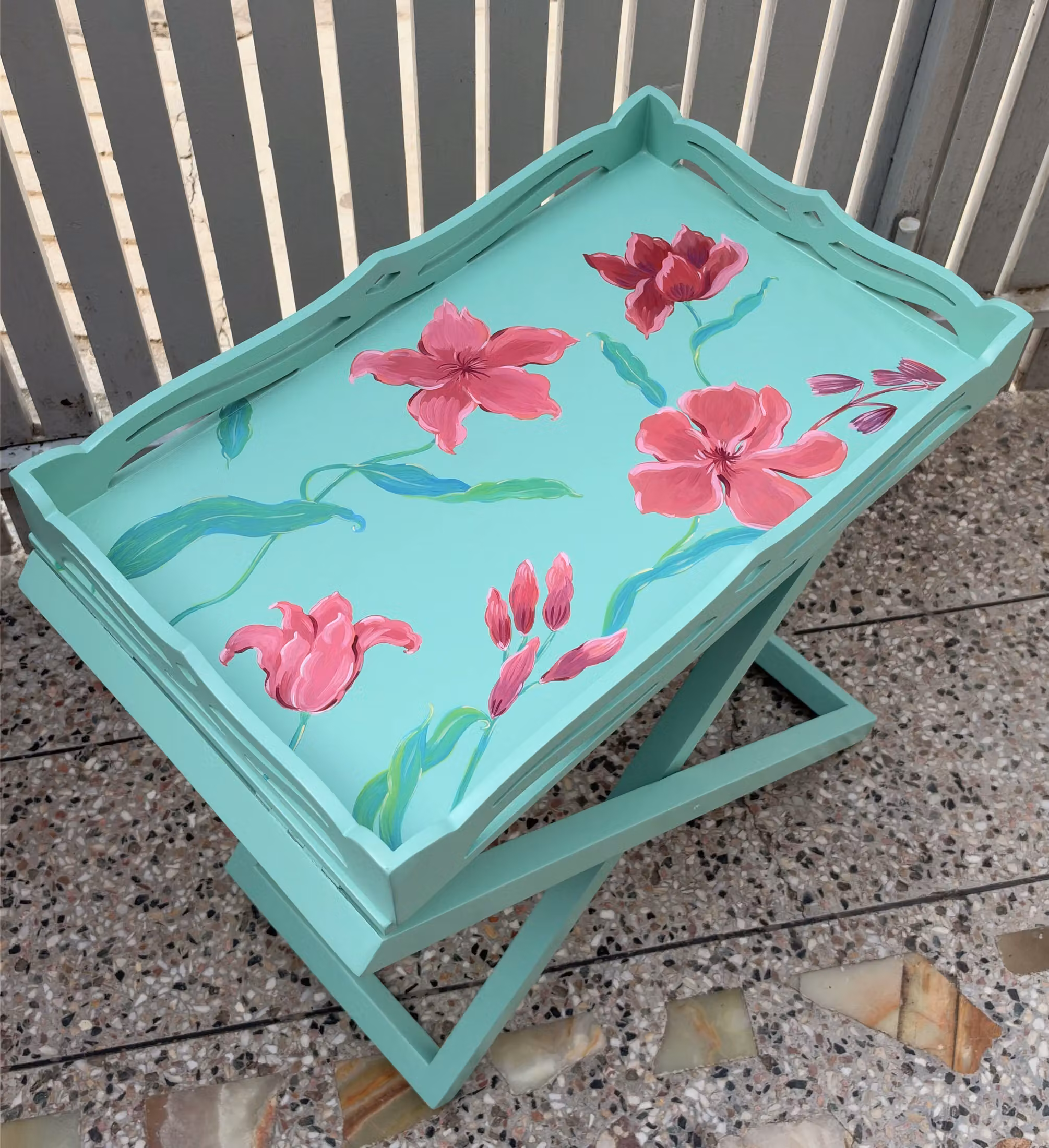 A green floral tray table